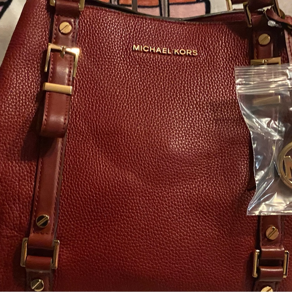 Pre-love authentic Michael Kors Burgundy  gold hardware Leather Shoulder Bag